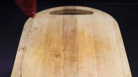 Put raw meat on a cutting board Stock Footage 126573665