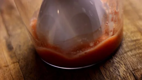 Put red tomatoes and meat juice in a blender. 4k video Stock Footage 157767801