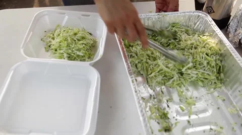 Put the salad in a box Stock Footage 49760557