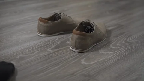 Put shoes on Stock Footage 125128611