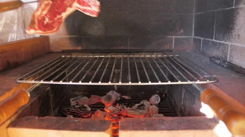 Put steak beef on grill 4k Stock Footage 146462590