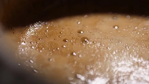 Put sugar in espresso coffee  slow motion Stock Footage 83993677