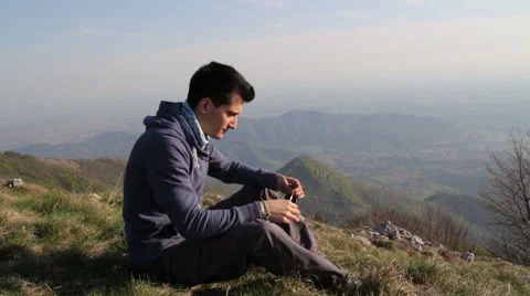 Put sunglasses on top of the mountain Stock Footage 49891913