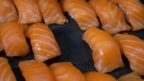 Put a sushi salmon Stock Footage 128609559