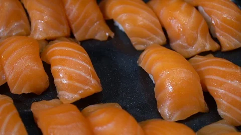 Put the sushi salmon Video stock 128609583