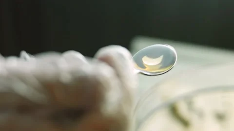 Put a tablespoon of vanilla syrup extract. Ingredients for the dough with a Stock Footage 165363478