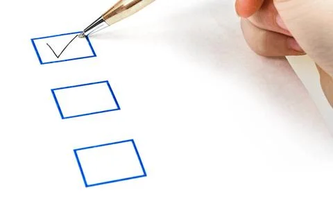 Put tick in blue square box put tick in blue square box by metal gold pen ... Stock Photos