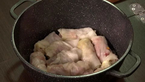 Put tolma in the pot 2 Stock Footage 325611450