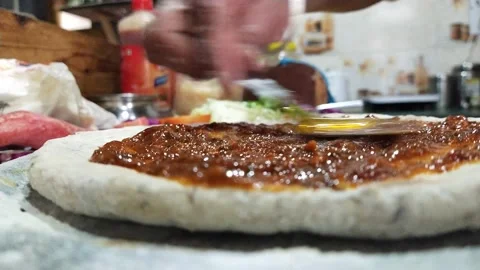 Put tomate paste on pizza preparing Video stock 238757589