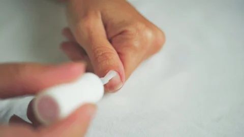 Put tranparent polish on the thumbnail 1- 50 zoom Stock Footage 98739330