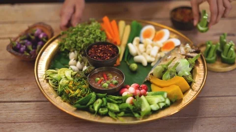 Put vegetable to the tray to make a Chilli paste Stock Footage 97712212
