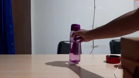Put a water bottle Stock Footage 225459329