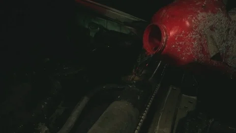Put water into hot engine Stock Footage 100868534