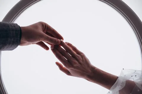 Put on a wedding ring Stock Photos