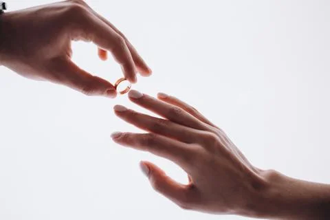 Put on a wedding ring Stock Photos