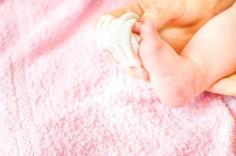 Put white socks at bebe Stock Photos