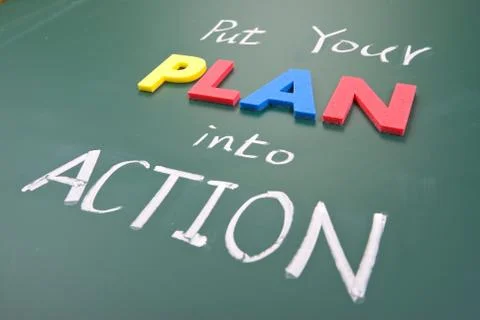 Put your plan into action, words on blackboard. Fotos Stock