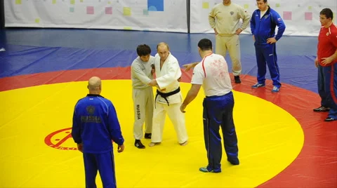 Putin in a kimono in training rolls Stock Footage 44218687