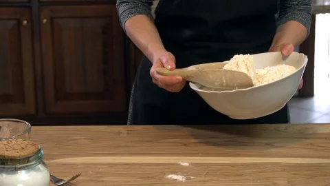 Puting flour on the table Stock Footage 90385262