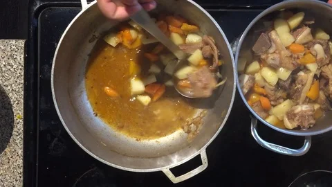 Puting food to another pot 2 Stock Footage 93462713