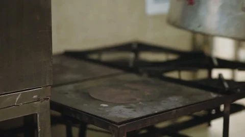 Puting a pot on the fire Stock Footage 87868553