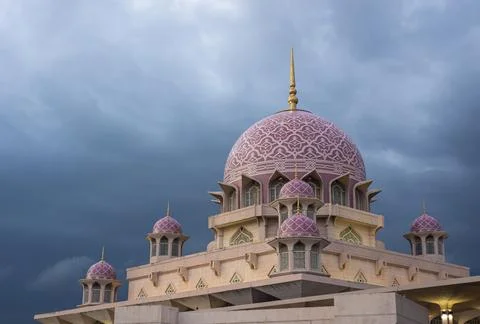 Putra Mosque closeup view with dark clouds. Travel Malaysia Stock Photos