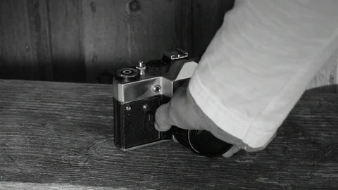 Puts the camera on the bench black and white Stock Footage 112917932