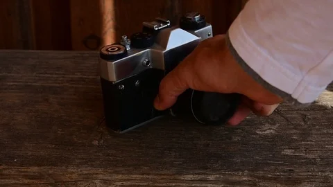 Puts the camera on the bench Stock Footage 112917918