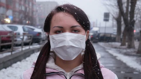 Puts on a protective mask. Stock Footage 128976927