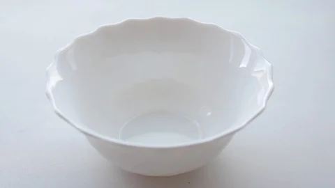 Puts a spoon ice cream in a white bowl Stock Footage 110892230