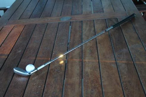 Putter golf ball table Fotos de archivo