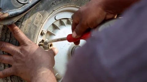 Putting air in a tire Stock Footage 65787494