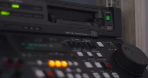 Putting and ejecting tape from linear video editing machine Stock-Footage 126266212