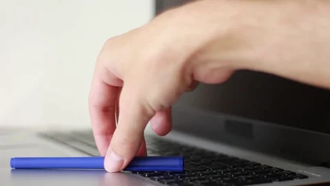 Putting and tacking pen from the notebook Stock Footage 77178317