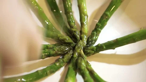 Putting asparagus on a plate Stock Footage 71732331