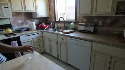 Putting away the dishes Stock Footage 10931265