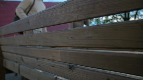 Putting the bag on the bench at the table in the beautiful scenery Stock Footage 46859066