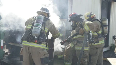 Putting of a barrel fire Stock Footage 130081067