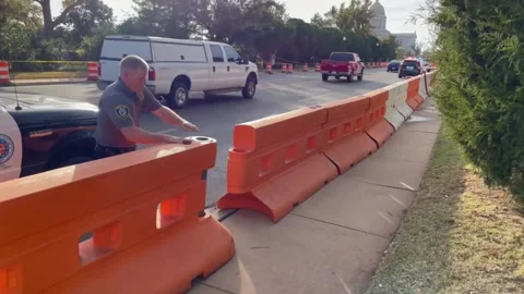 Putting up Barricade for Protestors Protesting Death Penalty in Oklahoma Stock Footage 264185818