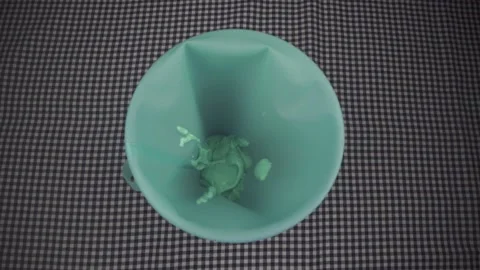 Putting batter into a piping bag Stock Footage 168465408