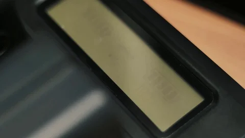 Putting battery on charger Stock Footage 85402175