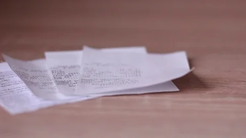 Putting bills on the table Stock-Footage 84676470