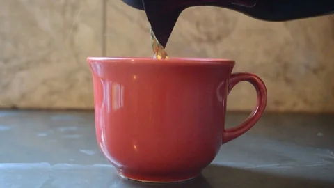 Putting black coffee in red cup; Breakfast coffee break concept 스톡 동영상 114995533