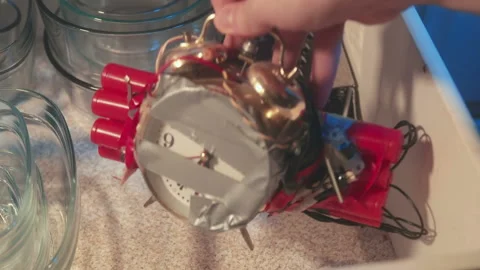 Putting bomb inside drawyer Stock Footage 144873202