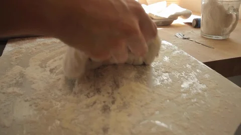 Putting bread dough on tray to put it in the oven - 02 스톡 동영상 130040287