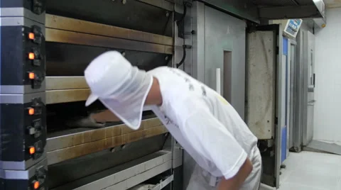 Putting Bread In The Oven Stock Footage 51332754