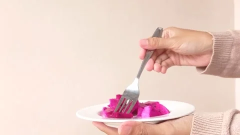 Putting a brown pebble on a soil Stock Footage 146253690