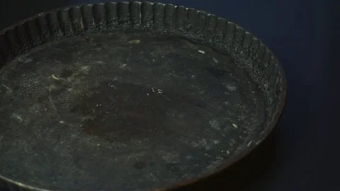 Putting bun with sauce on a plate Stock Footage 72960168
