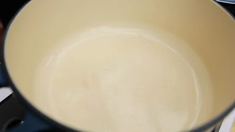 Putting butter on a pot Stock Footage 88816816