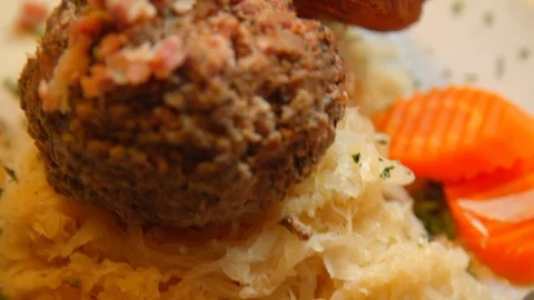 Putting Cabbage on Sausage Video stock 113283899